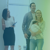 Homebuyers working with a trusted local real estate agent