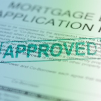 Homebuyers reviewing mortgage affordability and monthly payments